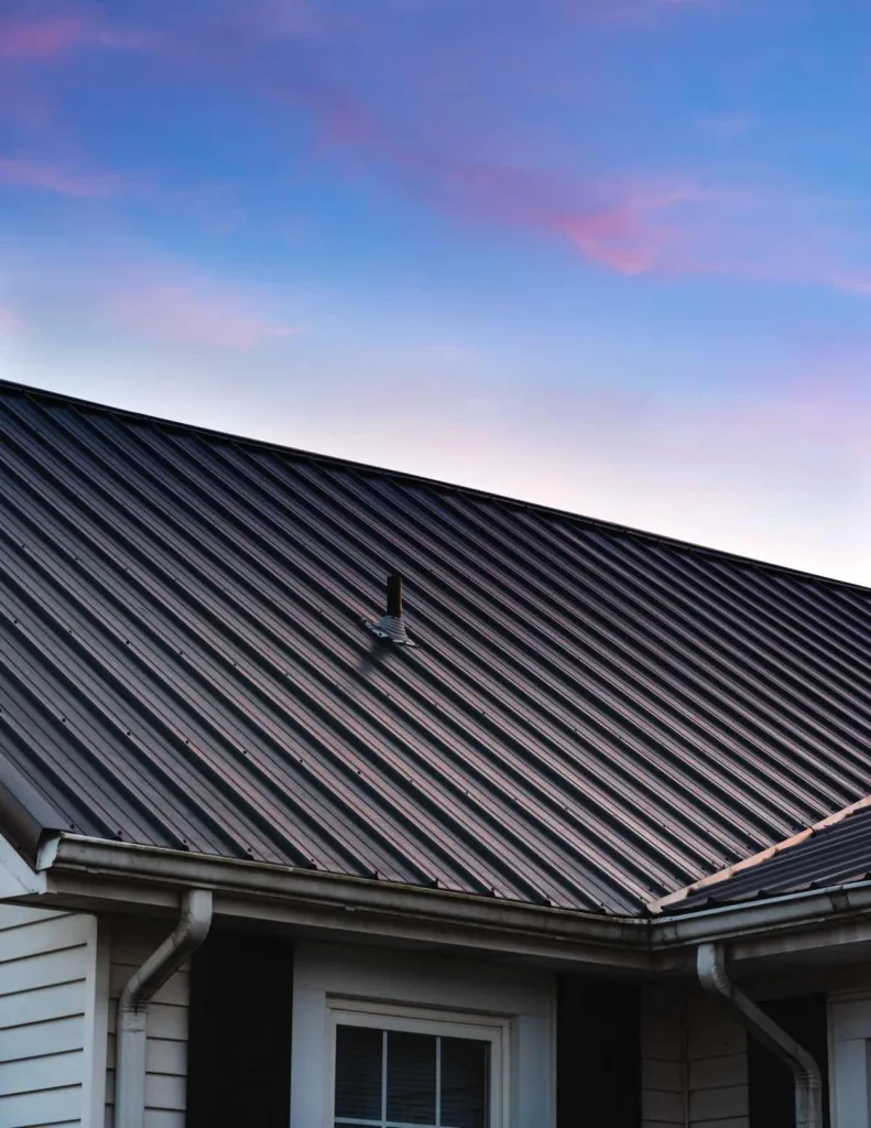Standing seam metal roof with clean vertical lines and hidden fasteners